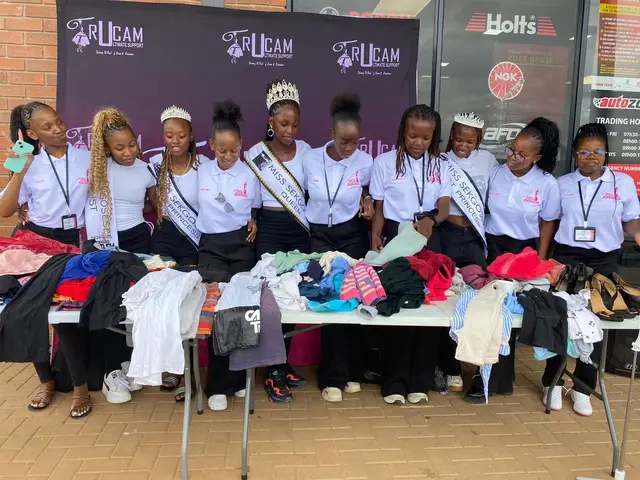 TruCam team and queens at the Joyful Hearts Drive donation tables